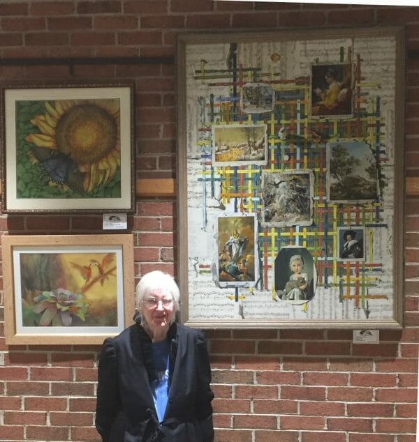 Sharon Craven Kinzer with her painting, Ribbons