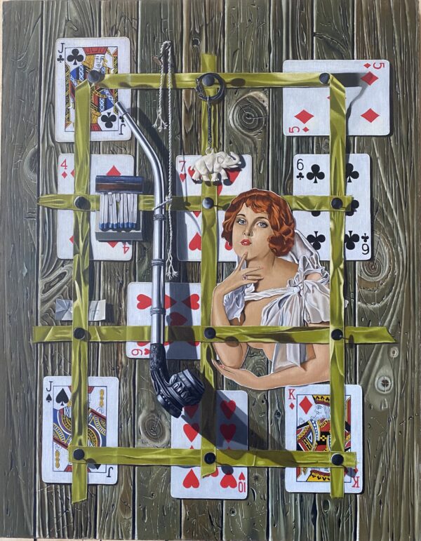 Trompe l'oeil painting with poker cards on top of rustic gray boards. Green ribbons are thumb tacked to the cards and the image of a woman's face is on top. Image also shows a decorative gray pipe and an ivory elephant key fob.